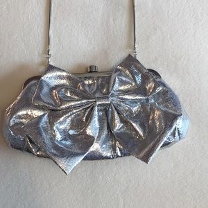 Badgley Mischka Silver clutch with Bow